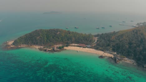 green-tropical-forestry-island-located-among-azure-ocean