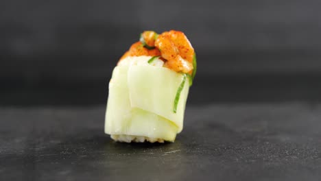 Sushi-served-on-grey-stone-slate