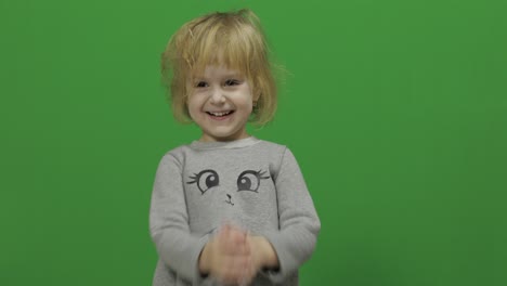 Kid-girl-on-a-Green-Screen,-Chroma-Key.-Happy-three-years-old-girl