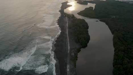 Panoramic-View-Over-El-Paredon-Beach-At-Sunset-In-Guatemala---drone-shot