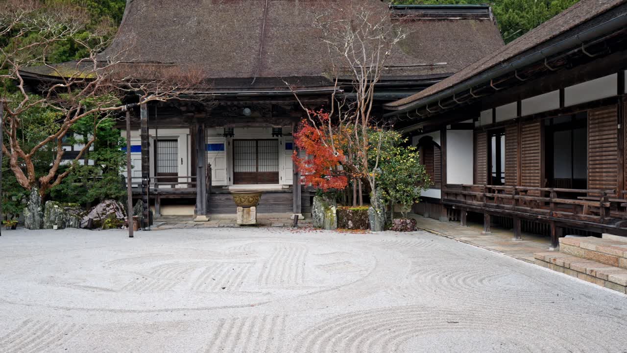 A peaceful view of the inner courtyard of a traditional Ryokan in Koyasan, Japan.