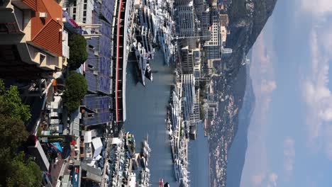 Yachts-and-Boats-in-Monaco-Port-Harbor-Marina,-Vertical-Panning-Shot