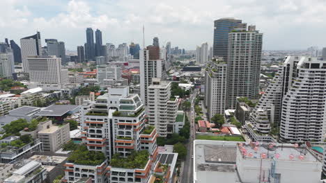 condominiums and apartment buildings in phrom phong, bangkok, thailand - drone shot
