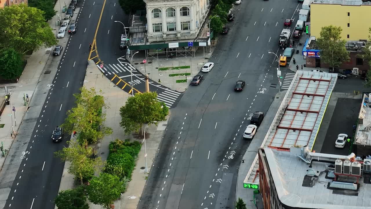 Aerial view of New York streets shows urban activity and traffic