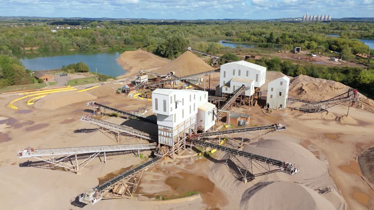 Quarry site near Nottingham captured by drone, showing aggregates, conveyor belts, and heavy plant machinery