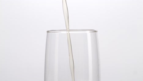 pouring beer into a glass