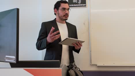 facilitator leading workshop with tablet
