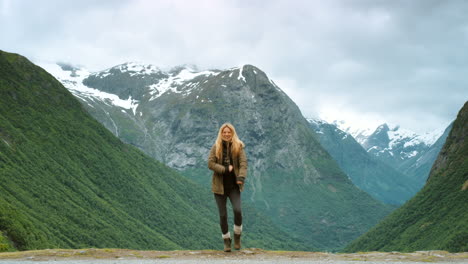 woman dancing in norwegian mountains