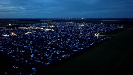 nighttime view of nova rock festival in pannonia fields ii, nickelsdorf, austria - aerial drone shot