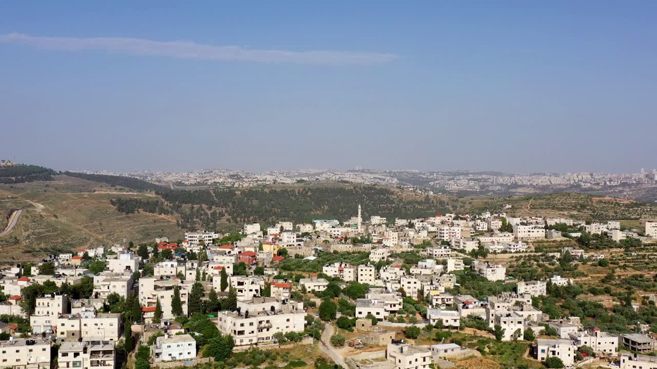 Aerial View of a Middle Eastern Village in Hilly Terrain