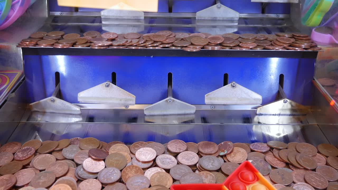 ビンテージ スタイルのレトロなペニー プッシャー マシン