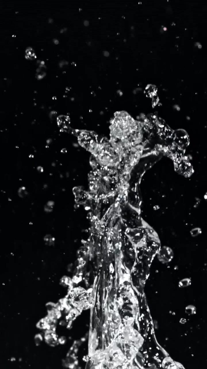 Dynamic Slow Motion Water Splash and Droplets on Black Background