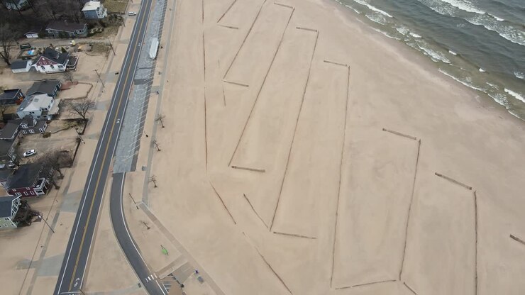 Sand fences giving structural support at a beach in Muskegon