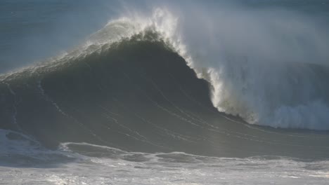 agressive breaking wave, rough shore