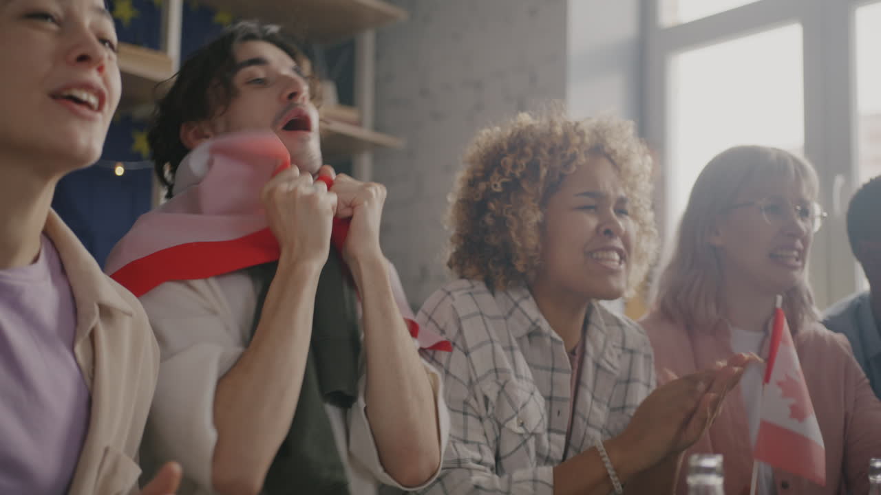 Friends cheering for their favorite team