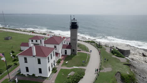 aerial orbit video of beavertail lighthouse in jamestown, rhode island