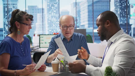 senior people discussing a pension financial strategy with broker