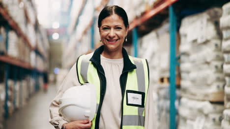 Woman warehouse worker in safety vest
