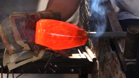 Hot-glass-slowly-being-shaped.-Blown-Glass-Factory