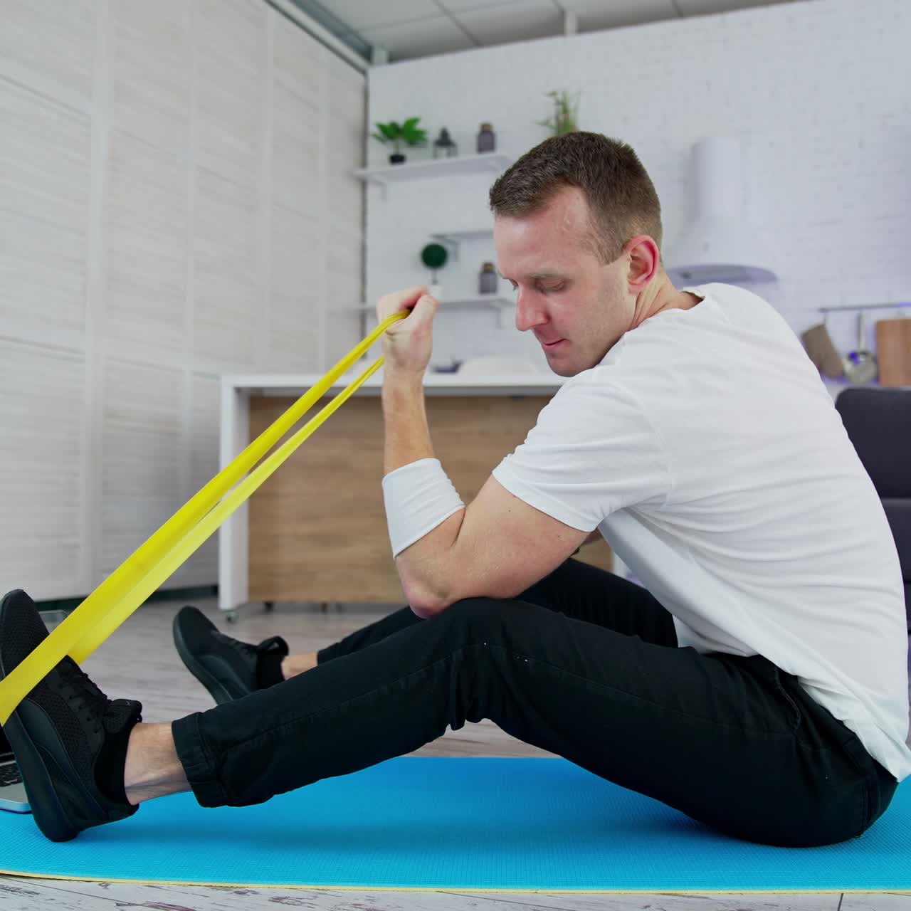 Man doing exercises at home