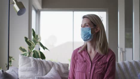 Woman-wearing-face-mask-at-home