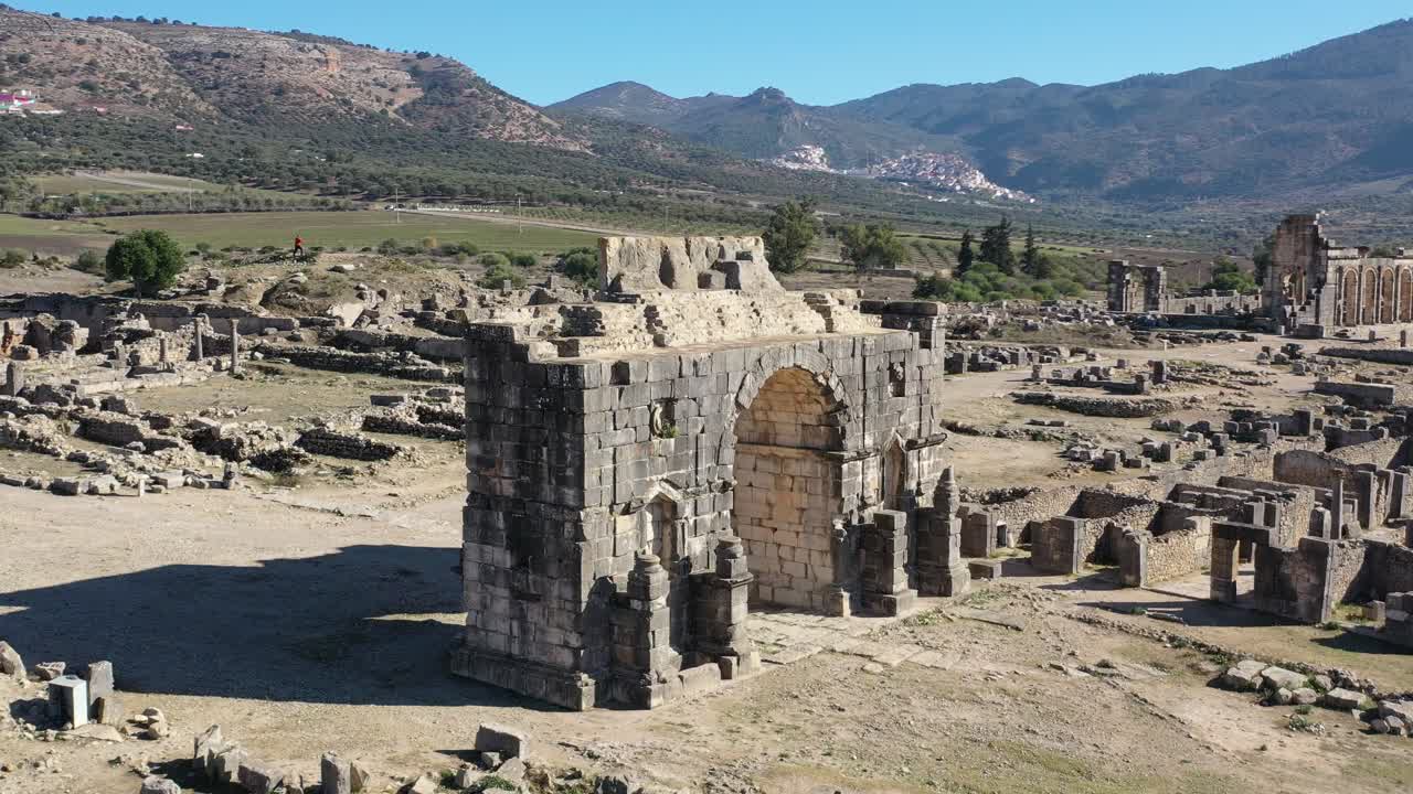Volubilis, an ancient city in Morocco, was a prosperous Roman settlement known for its mosaics, temples, and well-preserved archaeological remains