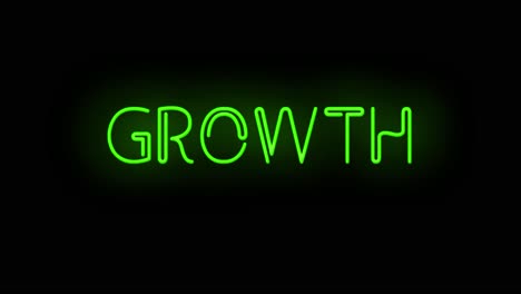 flashing neon green growth sign on black background on and off with flicker