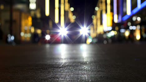 bokeh of car lights on street at night 4k