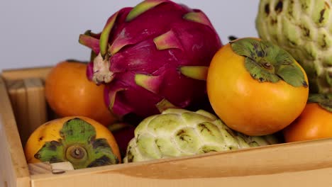 vibrant fruits displayed in a wooden crate