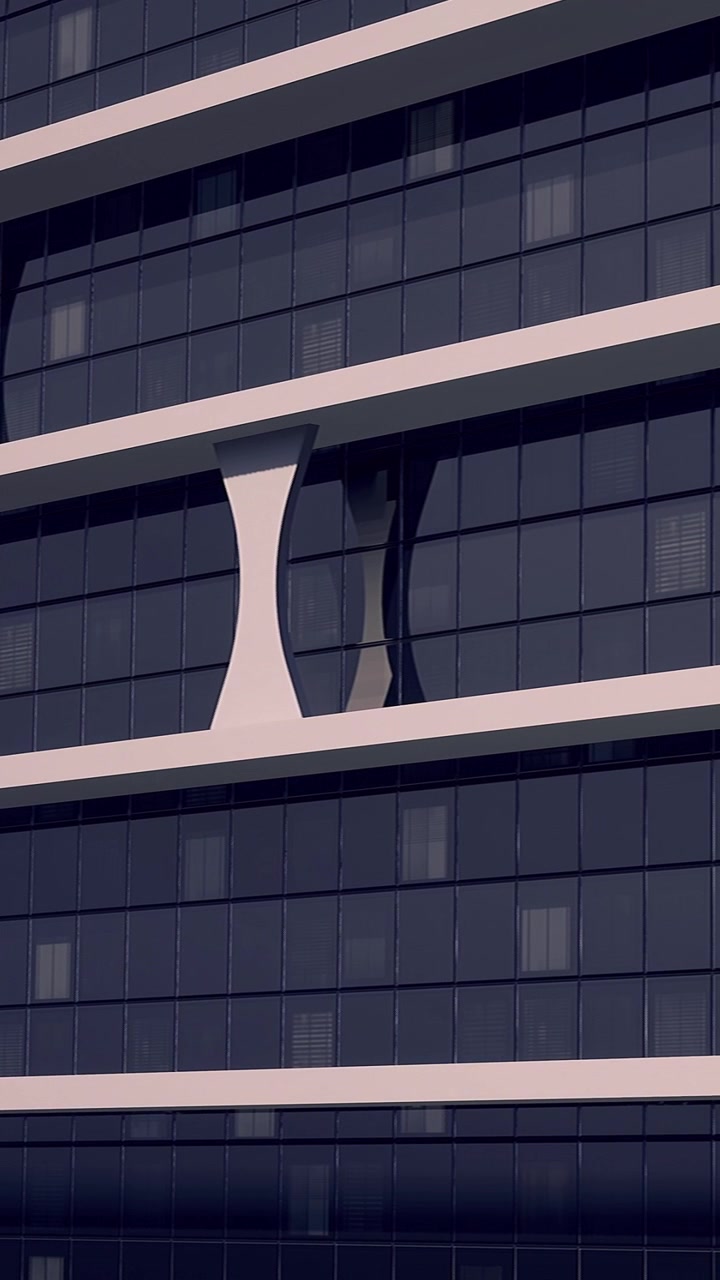 Il design moderno di un edificio presenta forme di finestre uniche in un contesto urbano.