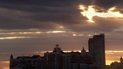 Sunset-flats-blocks-residential-area-sunset-drone-shot.-Evening-clouds-over-city