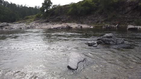 indigenous stone grey river rocks landscape at coastal sand hills south america córdoba province in calamuchita valley argentina