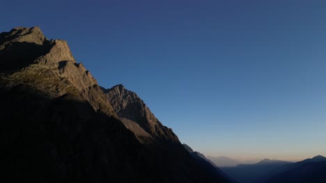 stunning drone footage of an alpine valley at sunrise