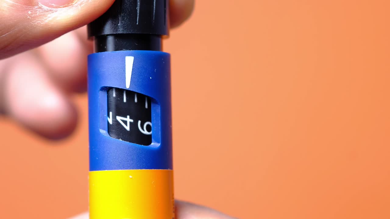 ajuste de la dosis de la pluma de insulina