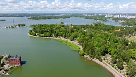 aerial view approaching the church at the hietaniemi cementery, in sunny helsinki