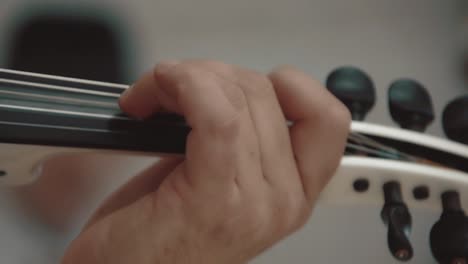 violinist playing the violin closeup slow motion