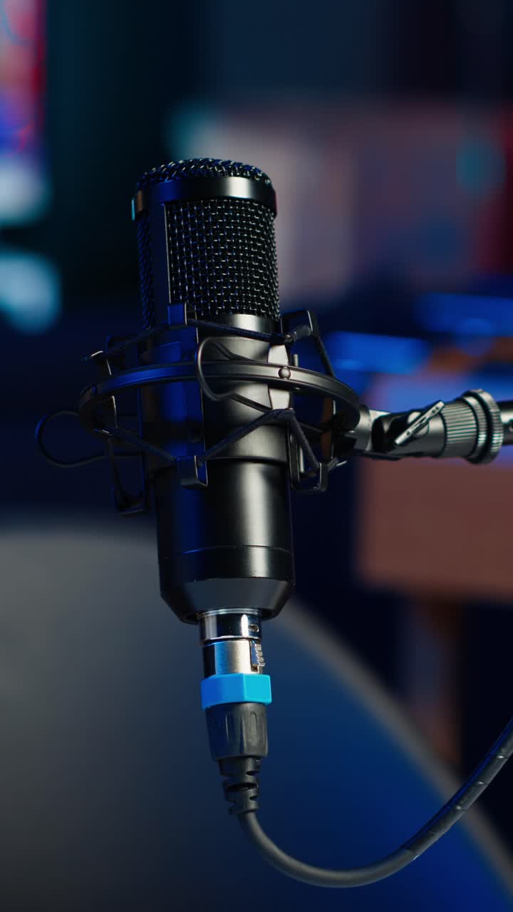 Vertical video Close up shot of professional microphone in empty studio