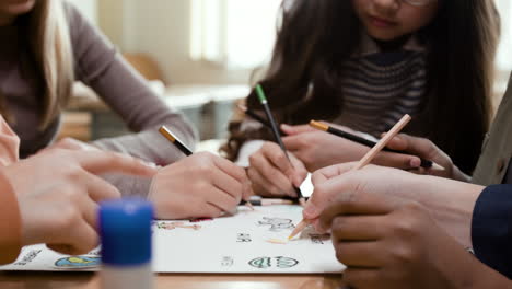 children collaborating on a drawing project
