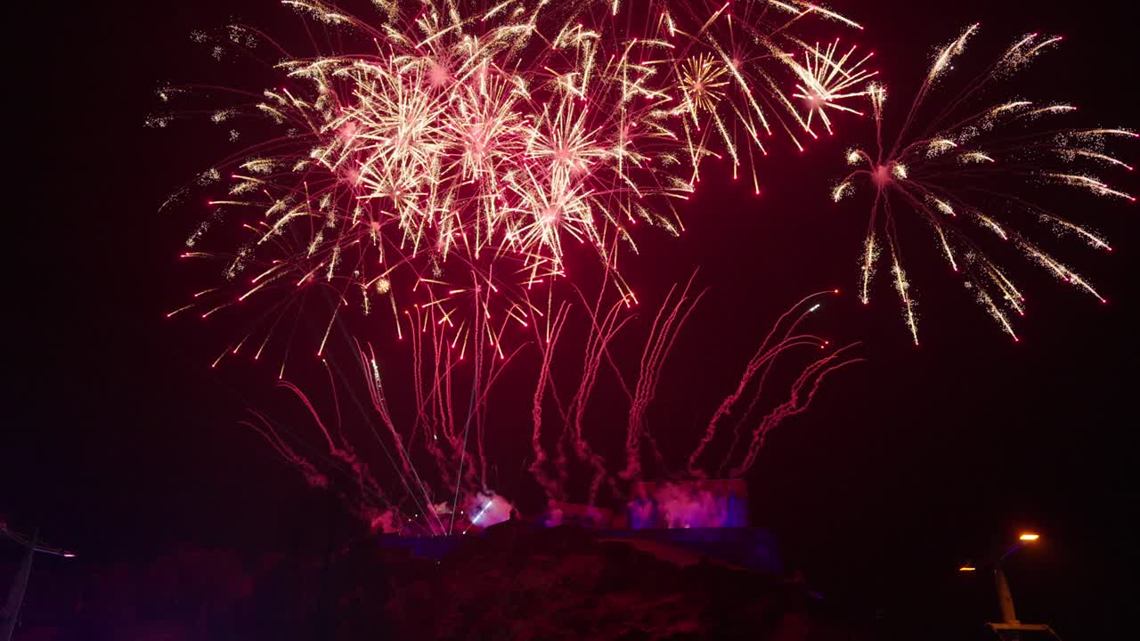 Fireworks over Edinburgh Castle on New Year's Day 2024 in slow motion