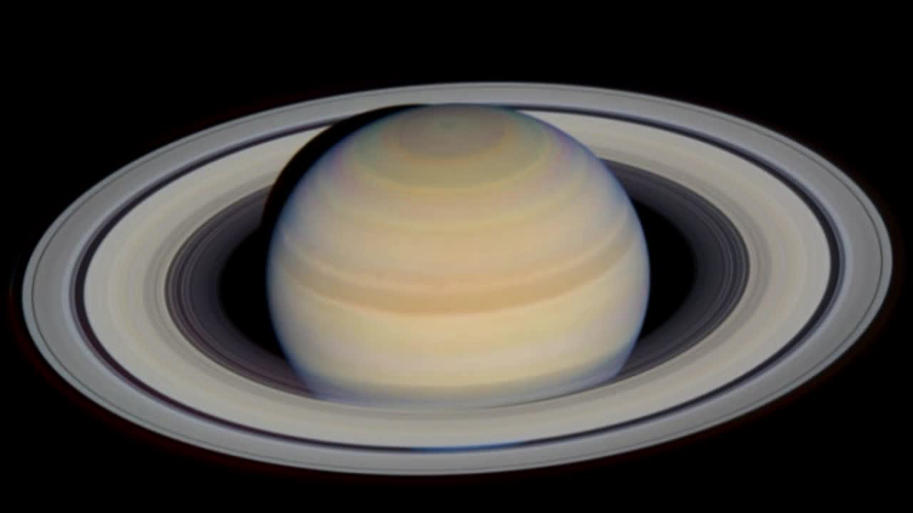 A detailed close-up view of Saturn, highlighting its iconic rings and atmospheric bands.