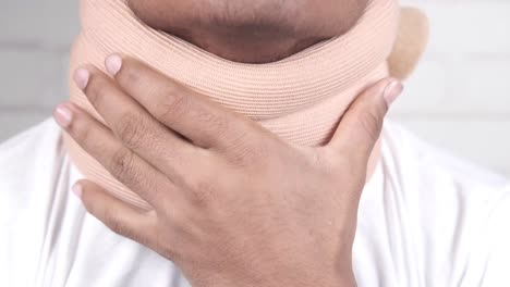 man wearing a neck brace