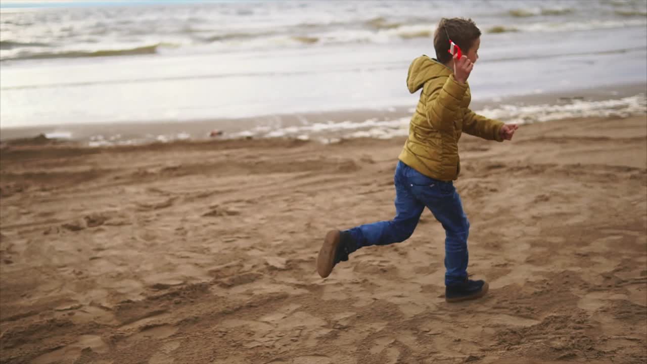 Boy Playing on the Beach