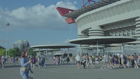 crowd of people outside a stadium