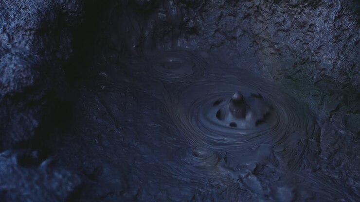 Mud bubbles in geothermal pool, Rotorua, New Zealand
