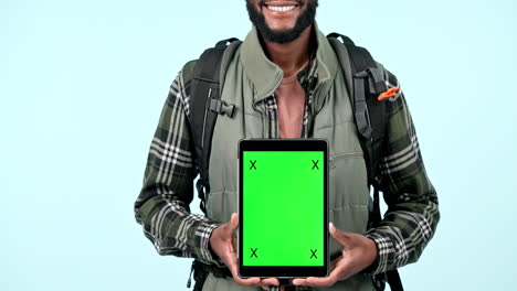 pantalla verde de la tableta, las manos