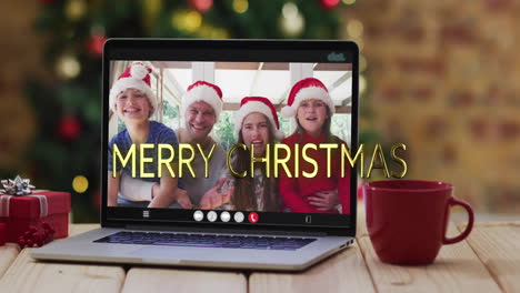 animation of merry christmas text over caucasian family on laptop screen and christmas decorations