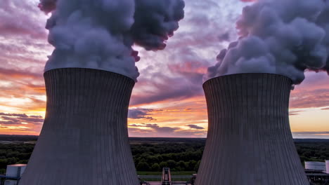 power plant cooling towers at sunset
