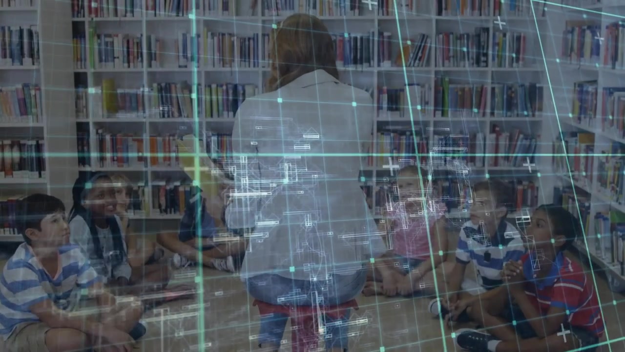 Educator opening picture book reading aloud and displaying glowing digital grid engaging students