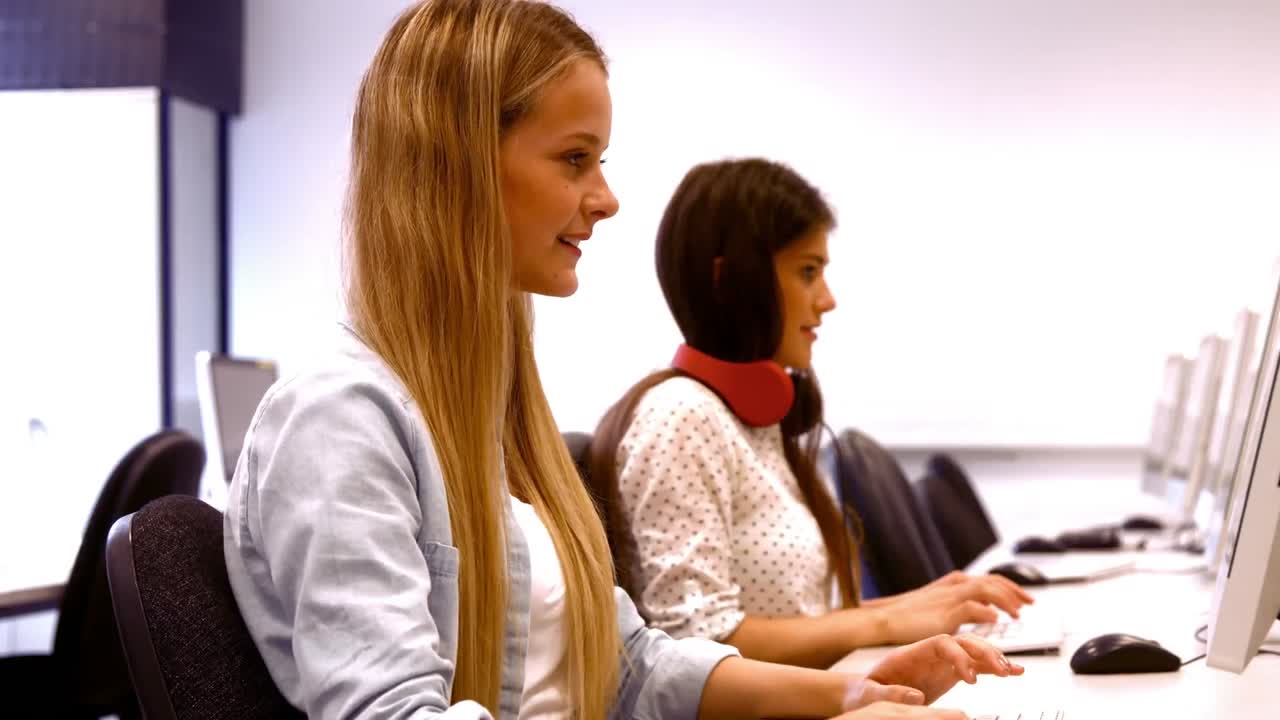 Two students working on computers