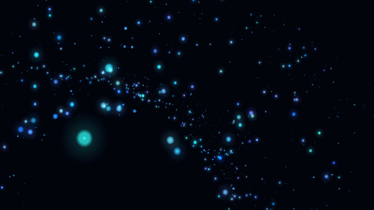 Animation of blue glowing spots of light twinkling and moving in hypnotic motion on black background